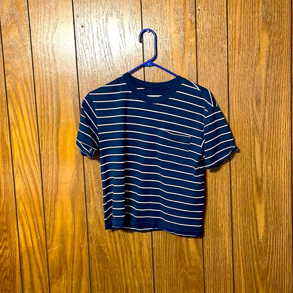 A striped shirt with a side pocket